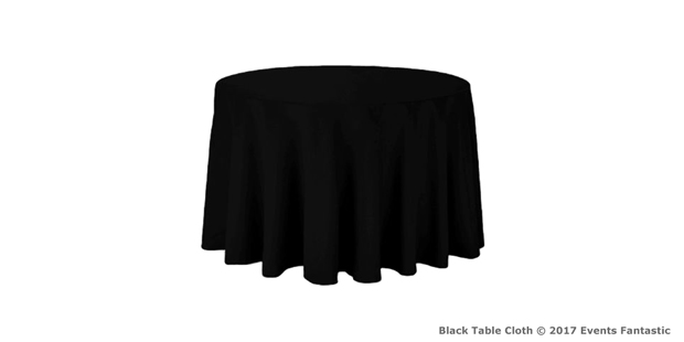 A round table covered with a black tablecloth.