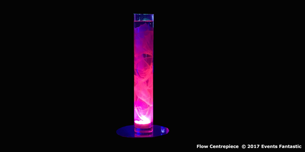 Colour fabric illuminated from within a cylinder vase