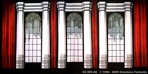 A backdrop depicting three large arched windows framed by red curtains, reminiscent of a classic cabaret club. The windows feature black framing and white columns with gray radiators below each window.