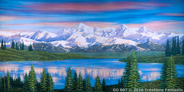 A serene landscape featuring a calm lake, dense pine trees, and snow-covered mountains under a blue and pink sky, perfect for camping in the Great Outdoors.