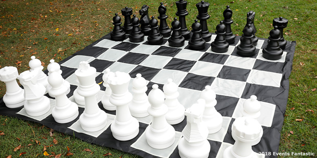 giant chess game on grass corner view