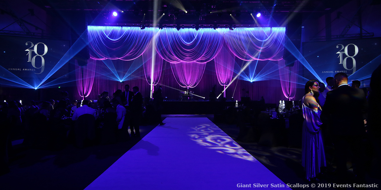 Giant Silver Satin Scallops Event Photo with White Carpet