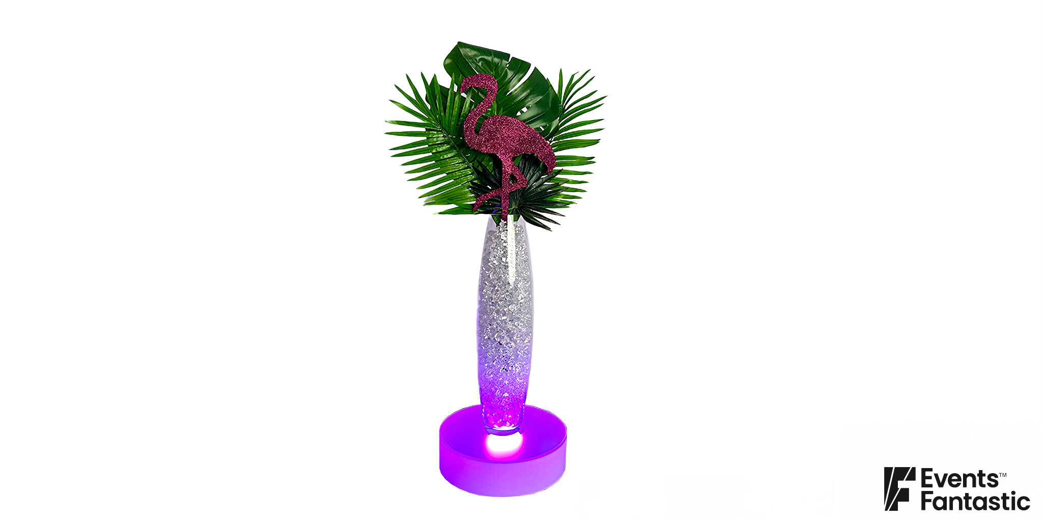 A decorative Havana Nights Flamingo Centrepiece featuring a glittery pink flamingo, green leaves, and a sparkly cylindrical vase on a lit-up round base.