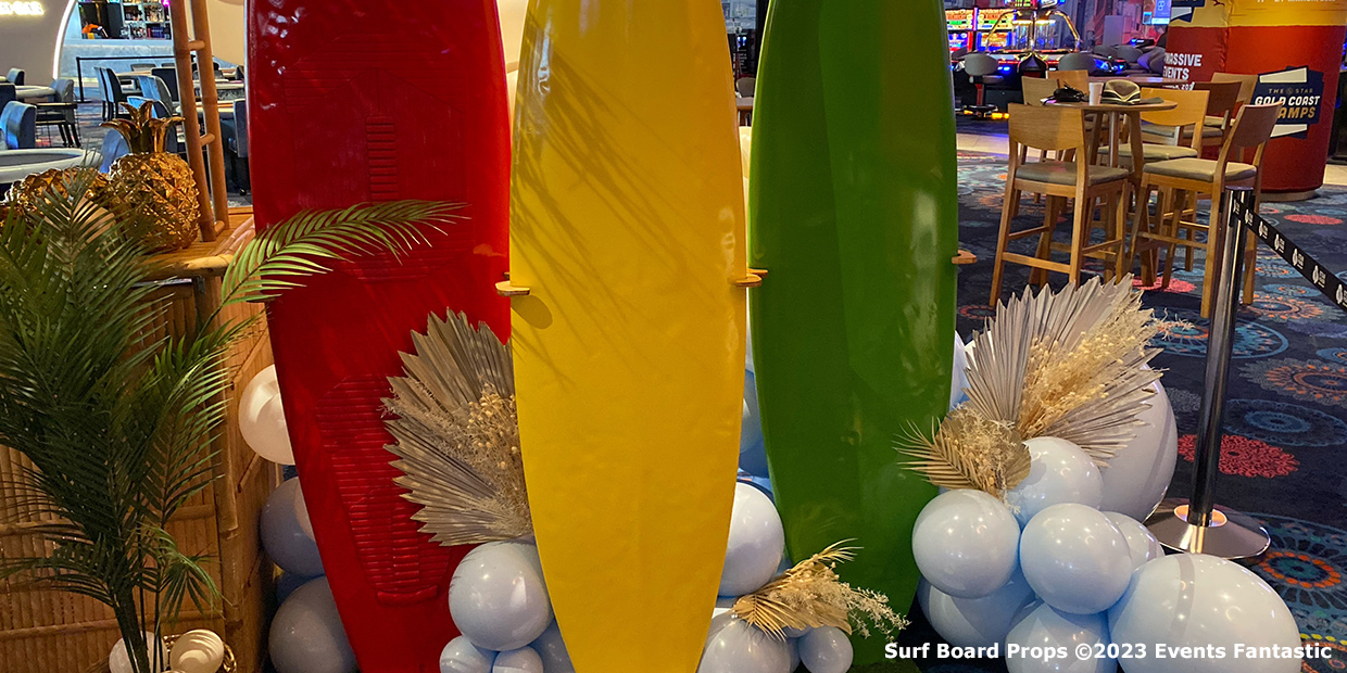 Red, Yellow and Green Surf Board Prop on Stands