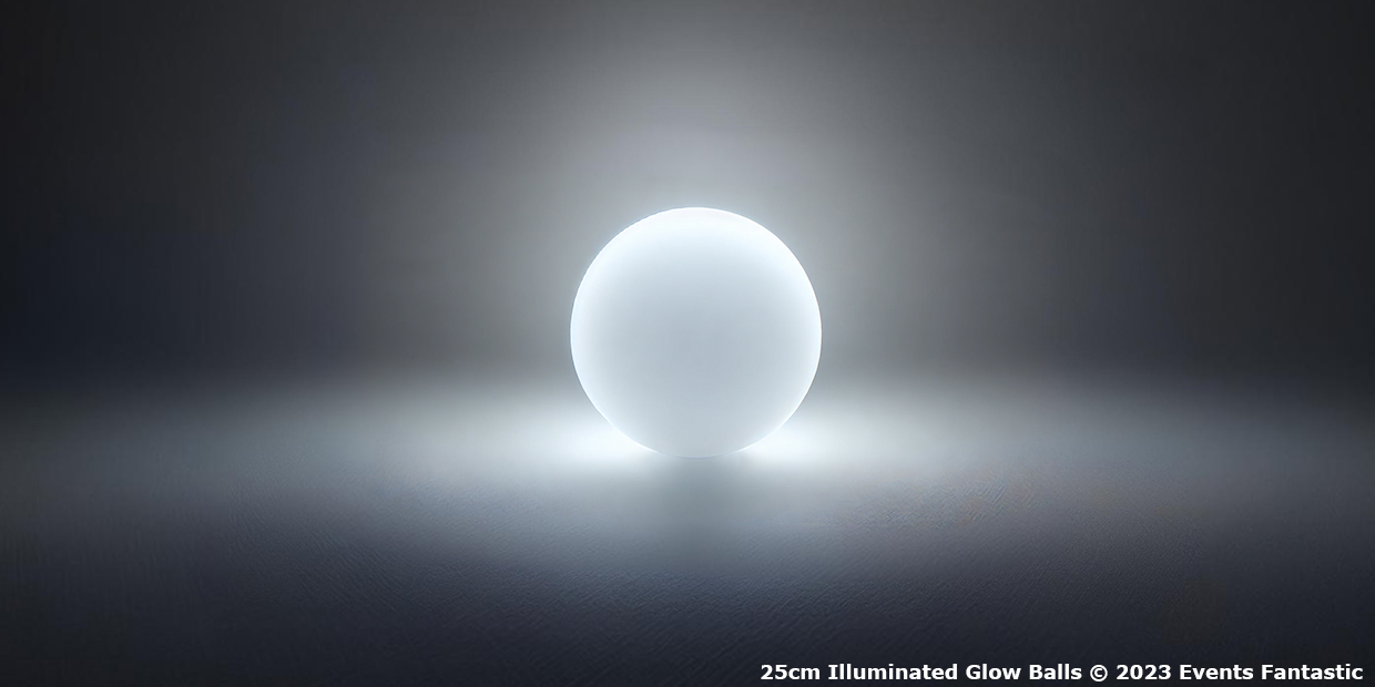 A 25cm illuminated glow ball emits a soft white light, sitting on a dark surface. The image has text in the bottom right corner.