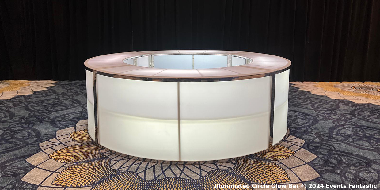 A circular Glow Bar stands on a patterned carpet in front of a black curtain. Text at the bottom reads, "Illuminated Circle Glow Bar © 2024 Events Fantastic.