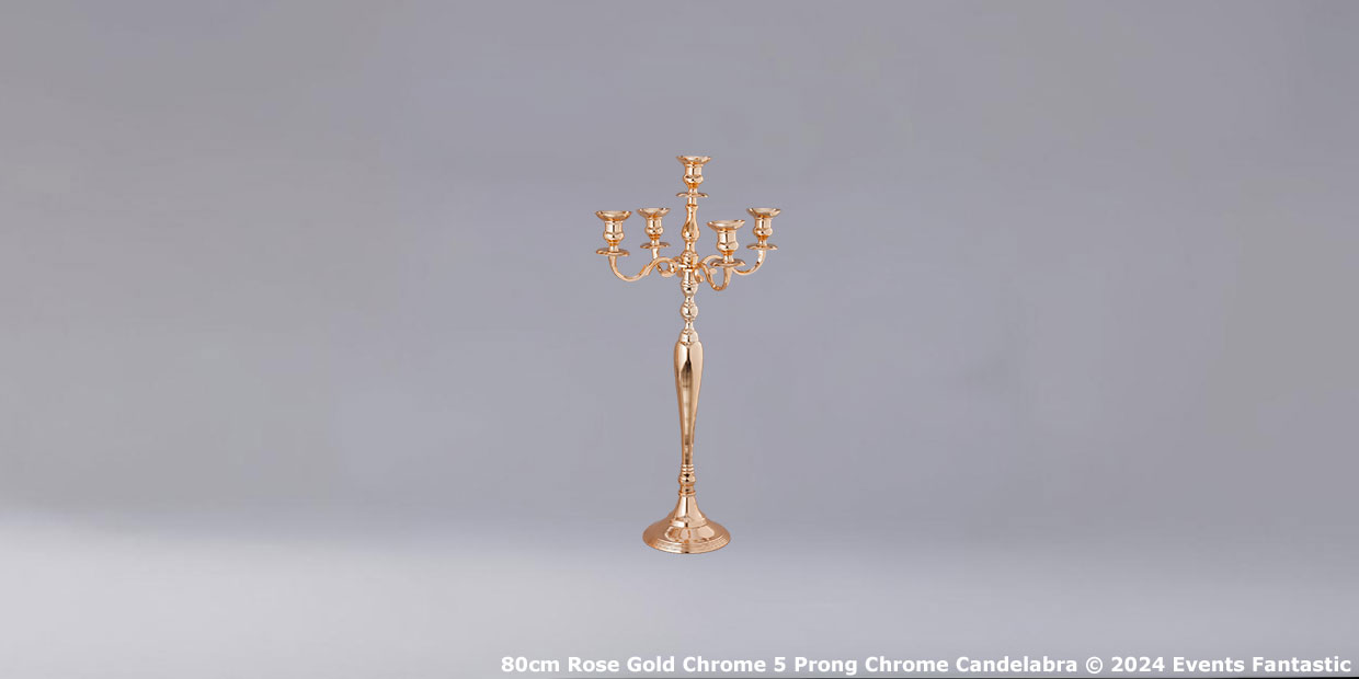 A rose gold chrome candelabra with five prongs, standing on a metallic base. Text at the bottom reads: "80cm Rose Gold Chrome 5 Prong Candelabra @ 2024 Events Fantastic.