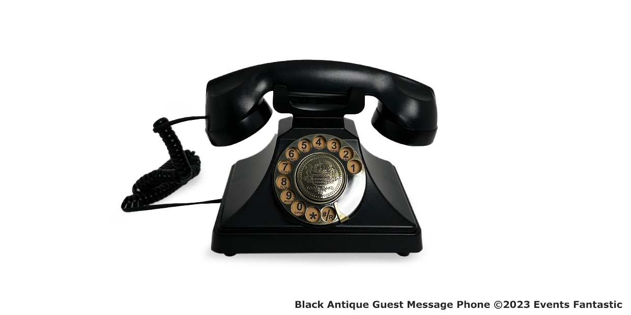 Black antique rotary dial telephone with a coiled cord, white numbers on a black background, and a central metallic dial—perfect for any guest room as an elegant message phone.