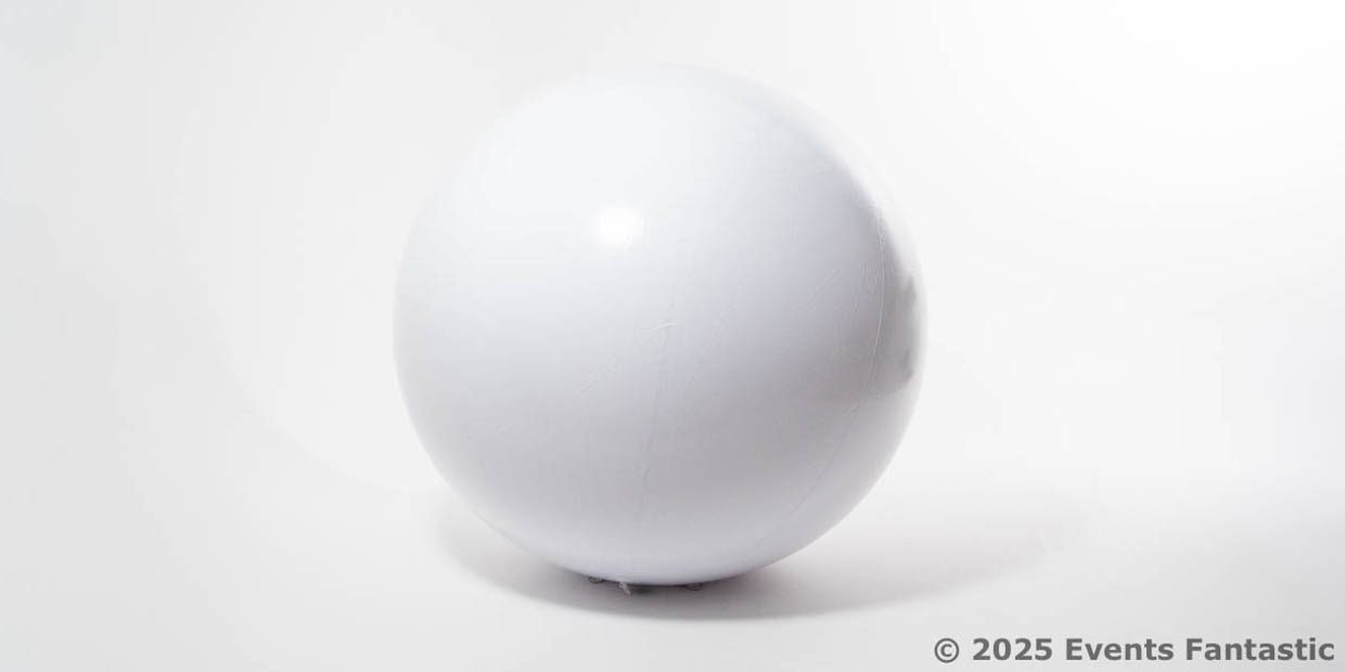 A plain Inflatable White Matt Ball sits on a white surface with a faint shadow; "© 2025 Events Fantastic" is in the bottom right corner.