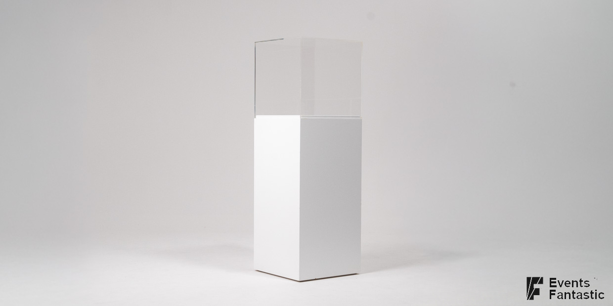 A white rectangular Perspex Plinth, 80cm tall, features a clear acrylic box on top and is positioned in a plain, well-lit studio setting.
