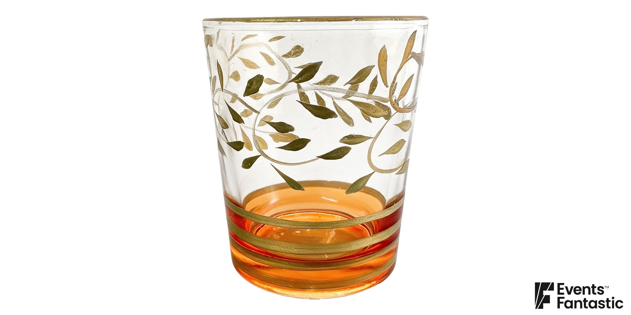 Decorated glass candle holder with gold leaf motifs above orange and gold bands around the lower body.